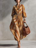 Robe midi à imprimé abstrait, manches longues et taille élastique