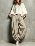Ensemble haut blanc à manches chauve-souris et pantalon sarouel kaki