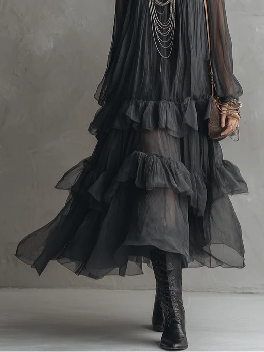 Robe longue transparente à volants superposés