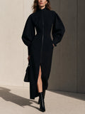 Robe midi noire avec fermeture éclair à l'avant et manches ballon