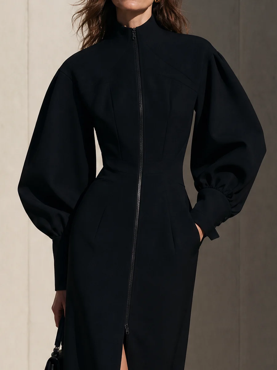 Robe midi noire avec fermeture éclair à l'avant et manches ballon